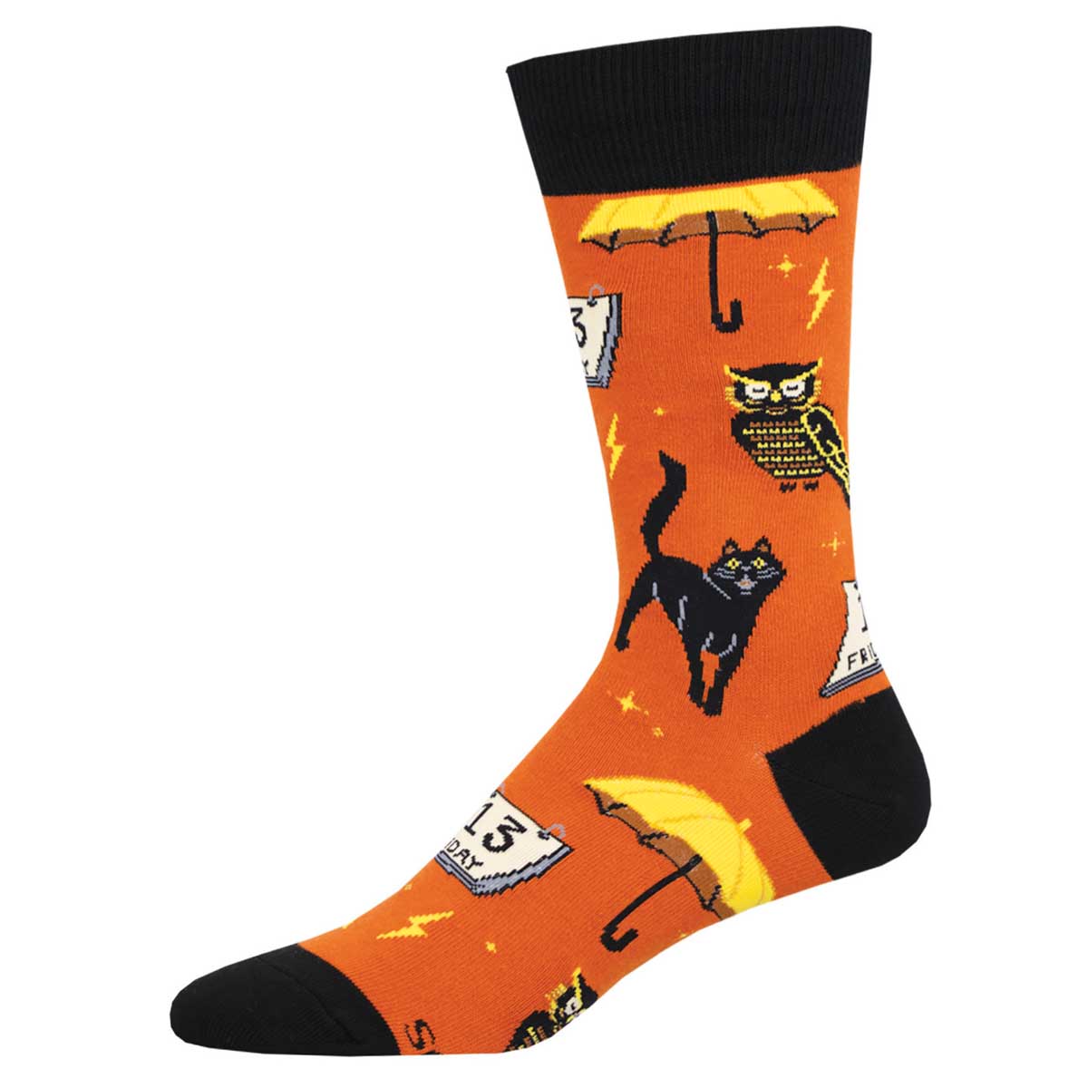 A pair of orange crew socks with a pattern of black cats, umbrellas, and other items associated with superstition.