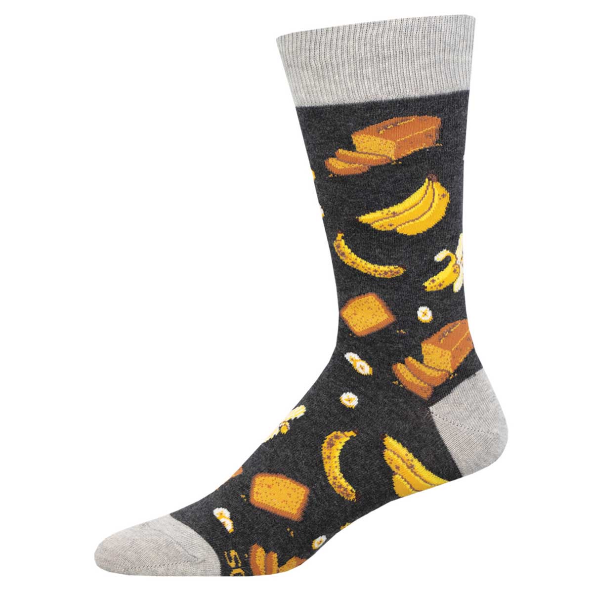 A pair of gray crew socks with a pattern of bananas, banana bread slices, and seeds.