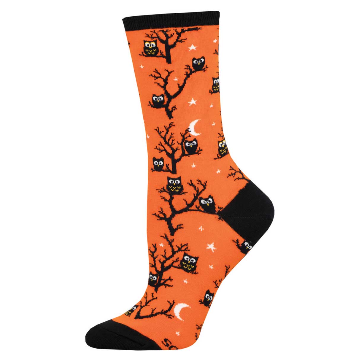 A pair of orange crew socks with a pattern of owls sitting on branches against a night sky background.