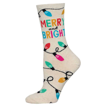 A pair of ivory crew socks with a 'Merry and Bright' text and colorful Christmas light patterns.