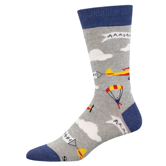 A pair of socks with a pattern that includes clouds, airplanes, and parachutes, predominantly gray with blue cuffs.