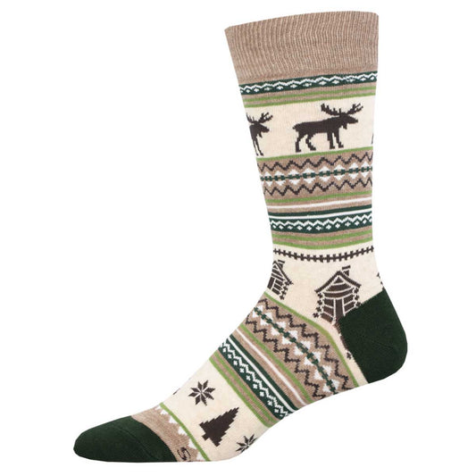 A pair of crew socks with a moose and cabin pattern in beige, brown, green, and white.