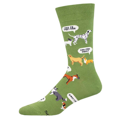 A pair of green crew socks with a pattern of various cartoon dogs in different poses and a text bubble that says 'Wanna hang?' amongst other phrases