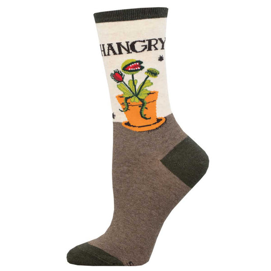 A pair of women's crew socks with a graphic venus fly trap design featuring the  text "Hangry". The socks have a beige heel, toe, and cuff, with the rest in a brown color.