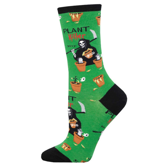 A pair of green socks with an illustration of a plant spirit taking over a human body, with the text 'PLANT KILLER' and various plants and soil elements depicted.