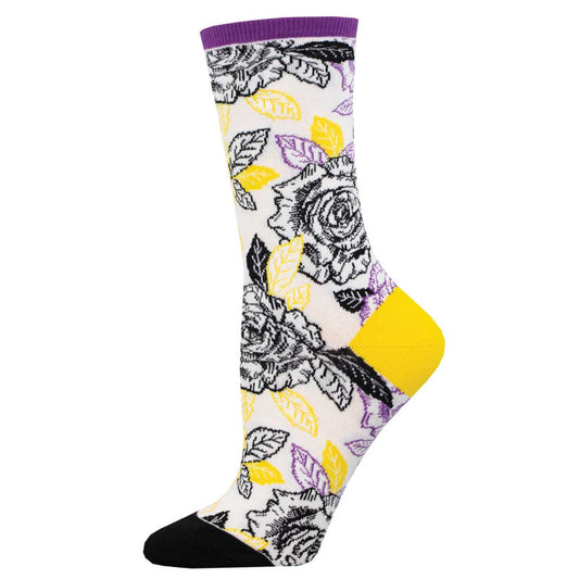 A pair of colorful crew socks featuring a floral pattern with black, white, yellow, and purple colors.
