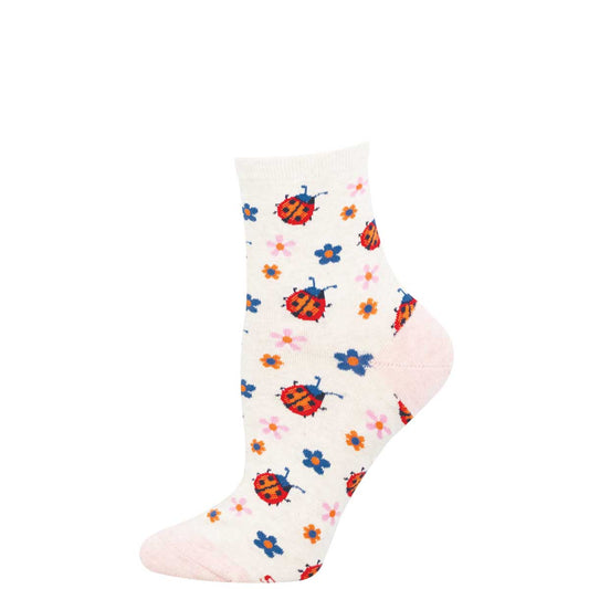 White sock with colorful ladybug and flower pattern on a white background