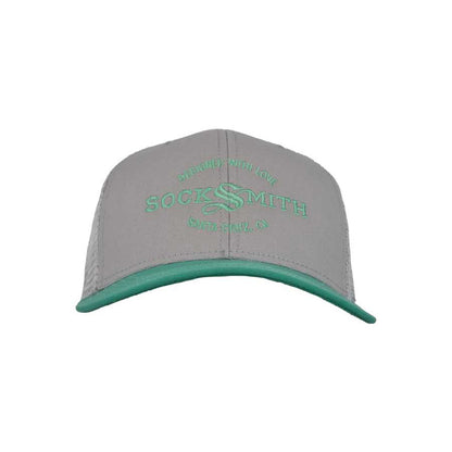 A light gray and teal trucker hat with 'SOCKSMITH' branding and the text 'DESIGNED WITH LOVE Santa Cruz, CA' on the front.