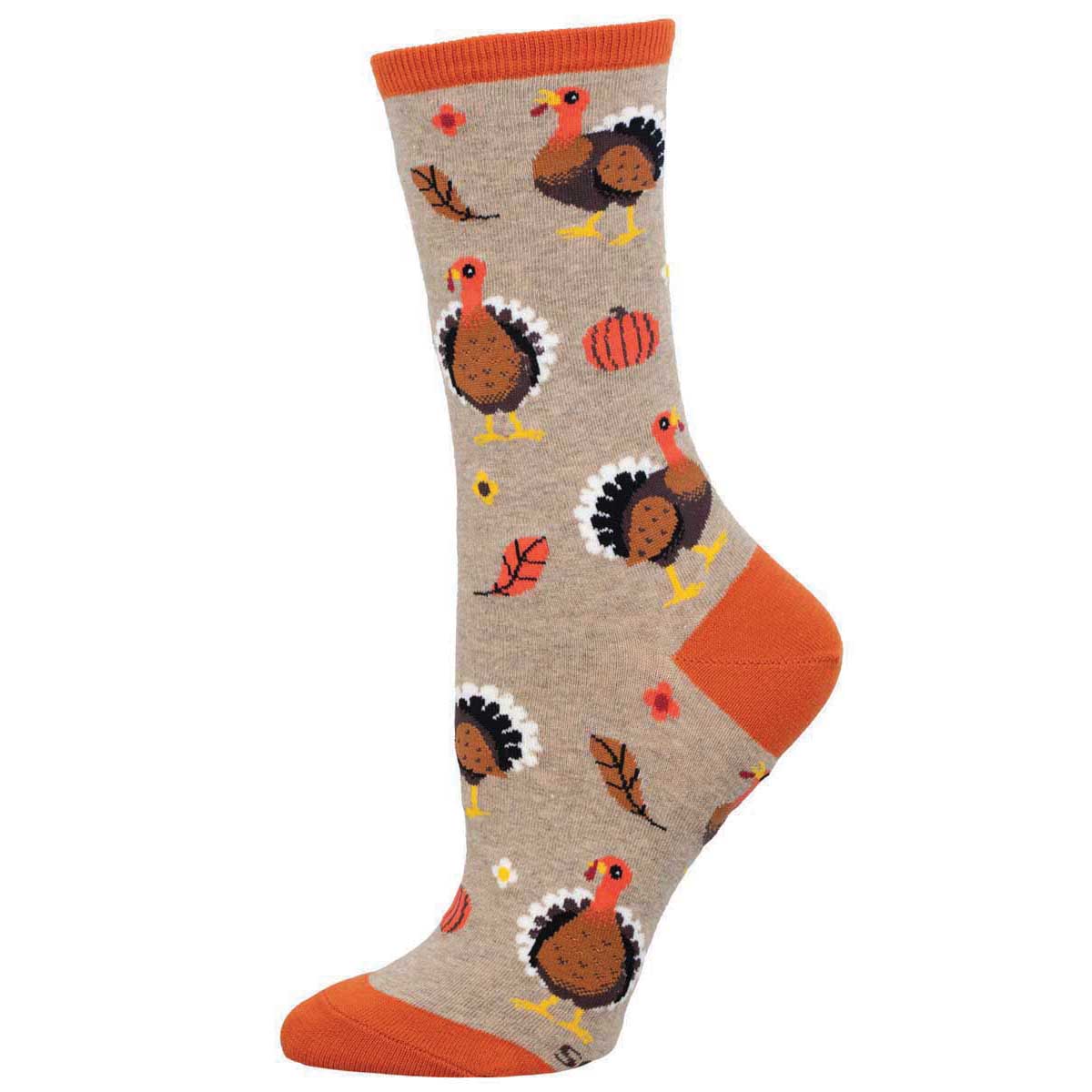 A pair of women's socks with a pattern of turkeys and autumn leaves on a beige background with orange at the heel, toe, and cuff.