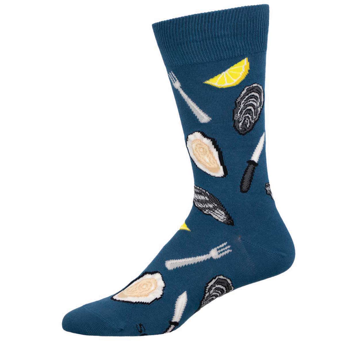 A pair of blue socks with a pattern of oysters, lemons, and kitchen utensils.